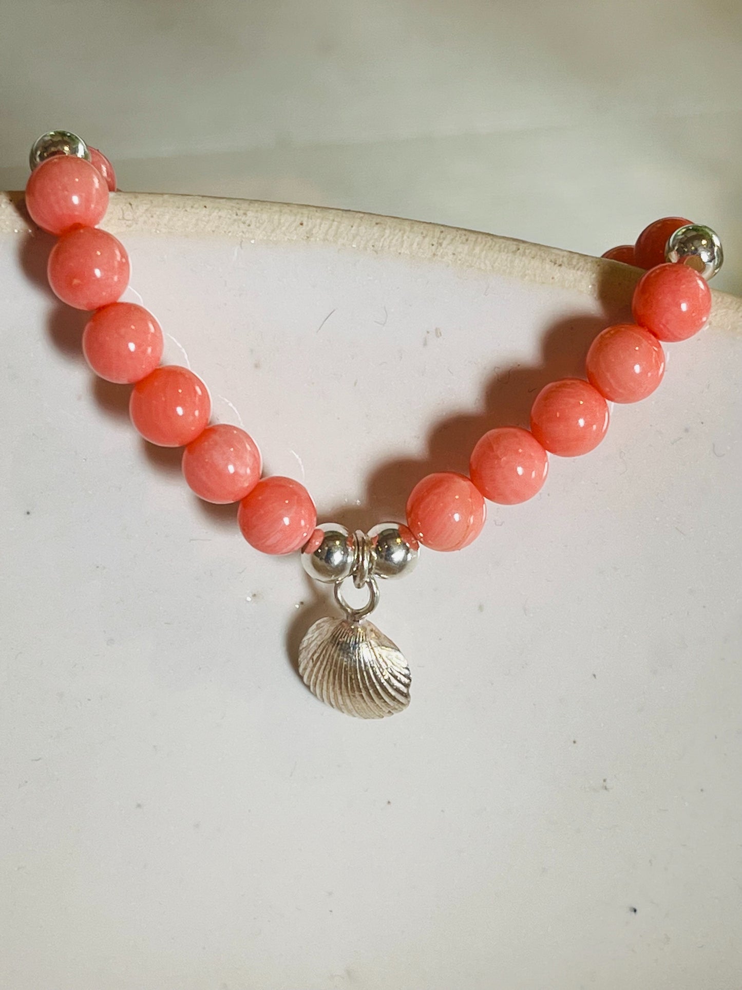 Chunky coral beaded bracelet.