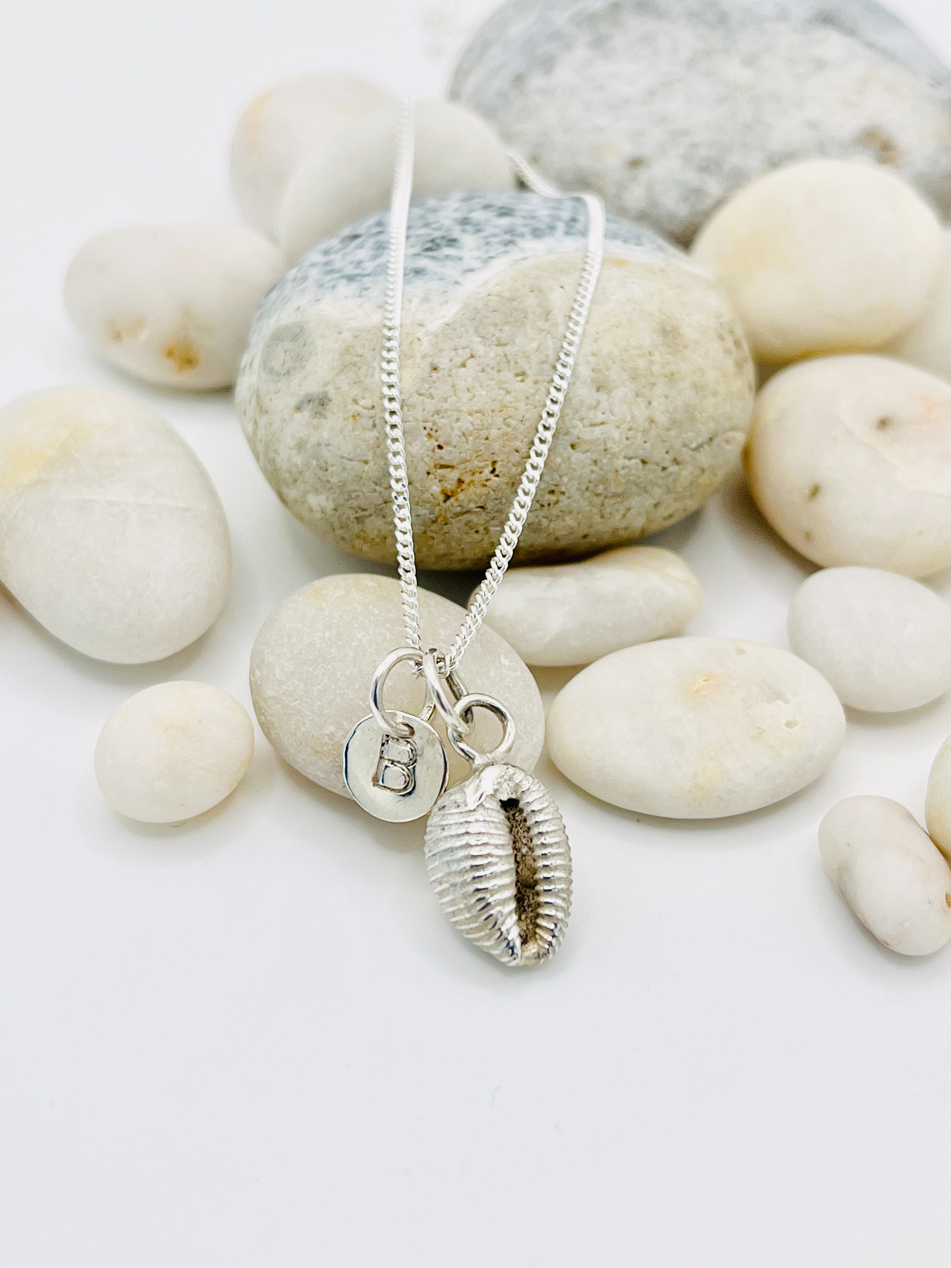 Solid Silver Cowrie Shell necklace.