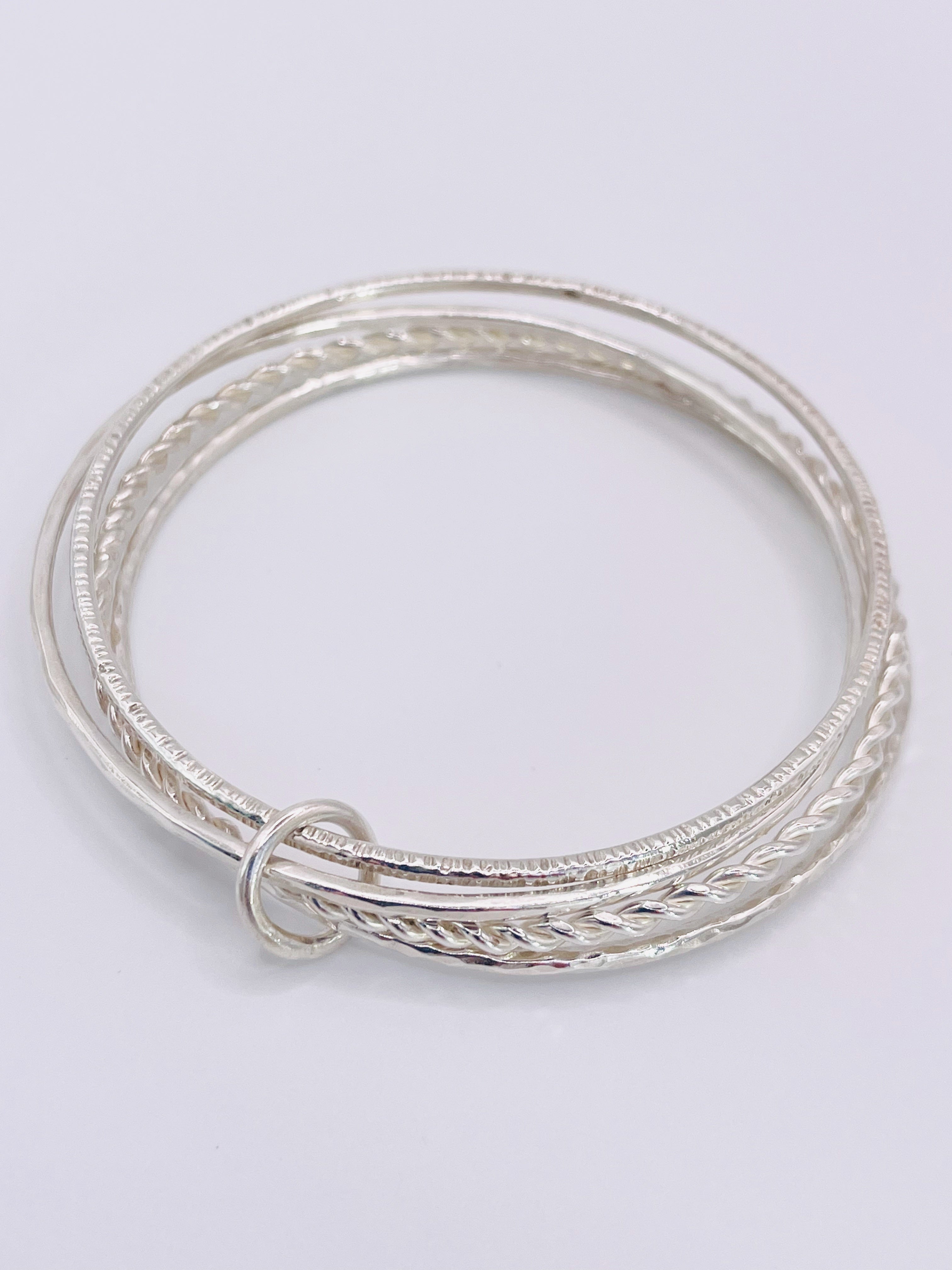 Multi textured Silver bangle.