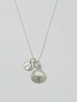 A personalised scallop necklace.