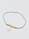 Silver beaded bracelet with silver star.