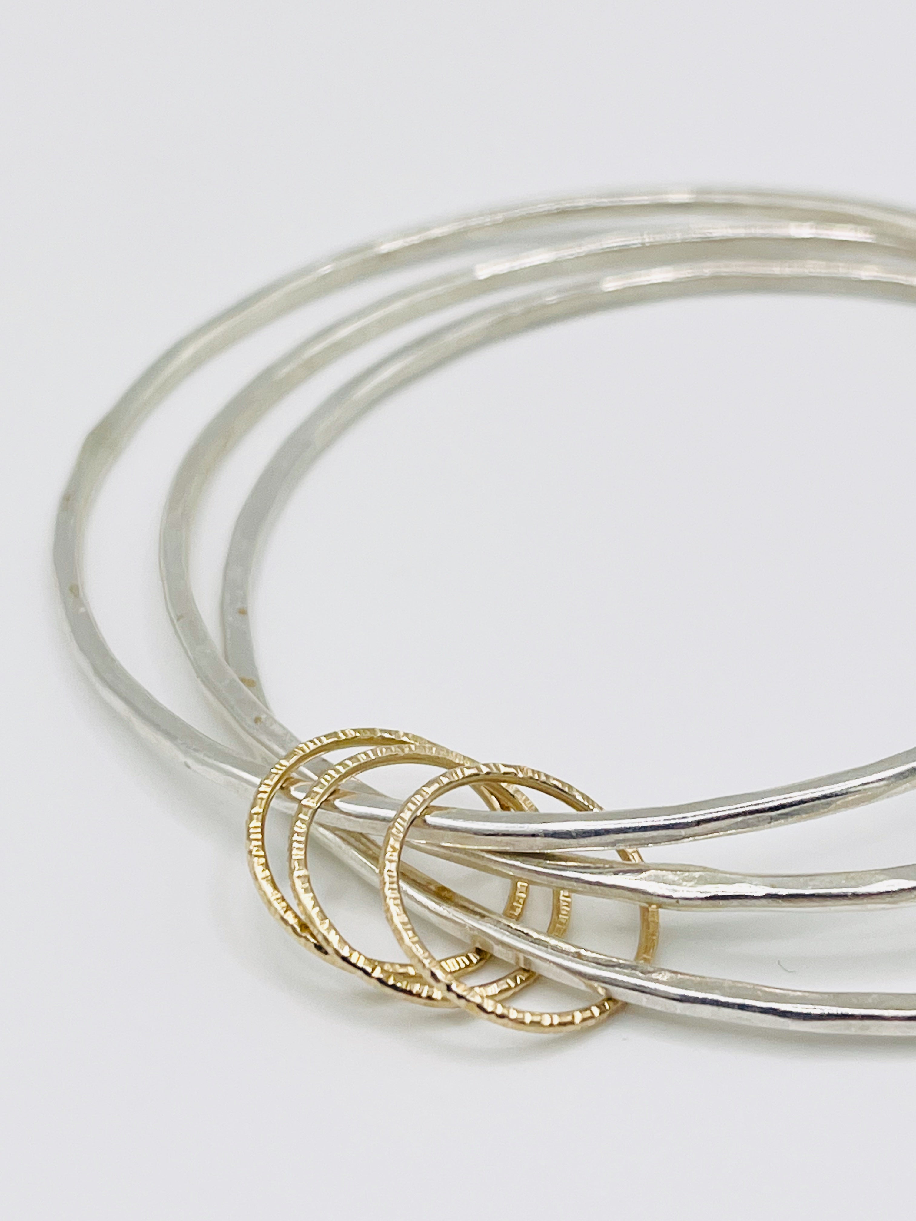 Triple Gold rings Bangle.