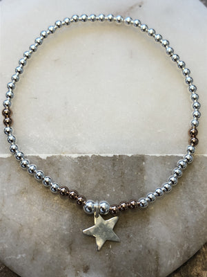 Silver beaded bracelet with personalised silver star.