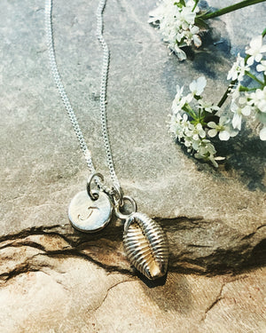 Solid Silver Cowrie Shell necklace.