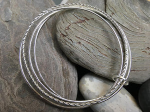 Multi textured Silver bangle.